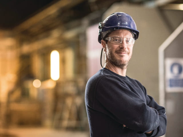 Fire resistance technician standing to the right