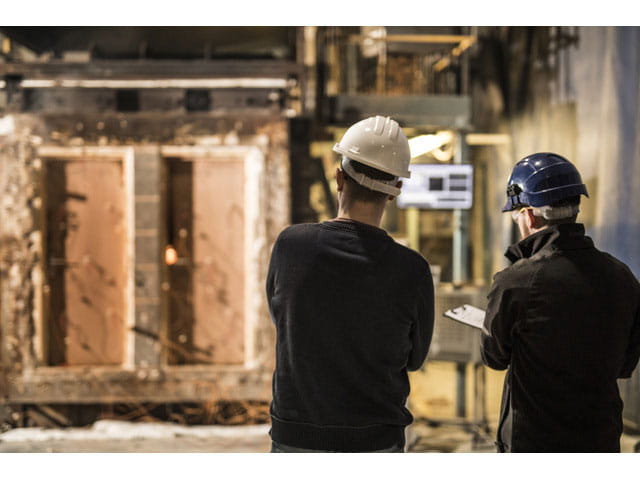 Fire resistance technicians standing to the right